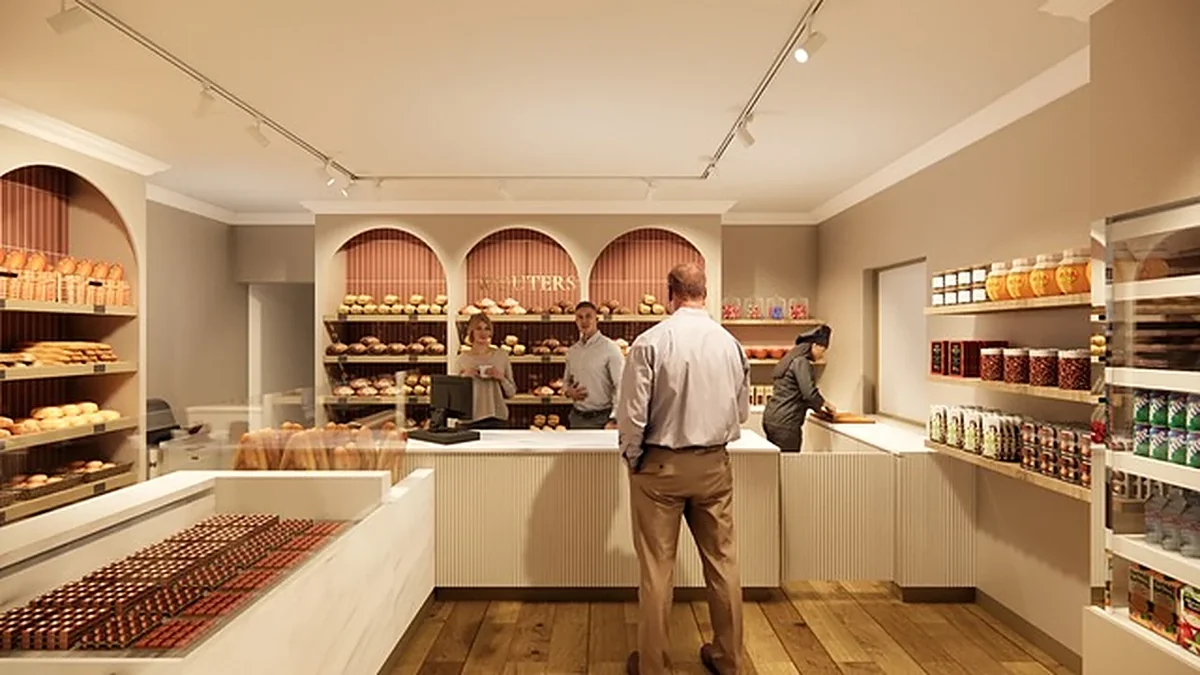 De toonbank van Bakkerij Wouters met broden in de boognissen